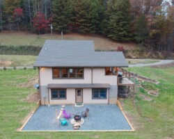Showing the Fire Pit Back of Cabin